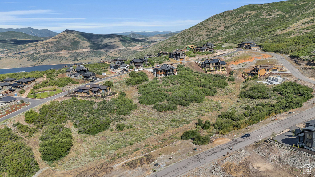 Birds eye view of property featuring a mountain view