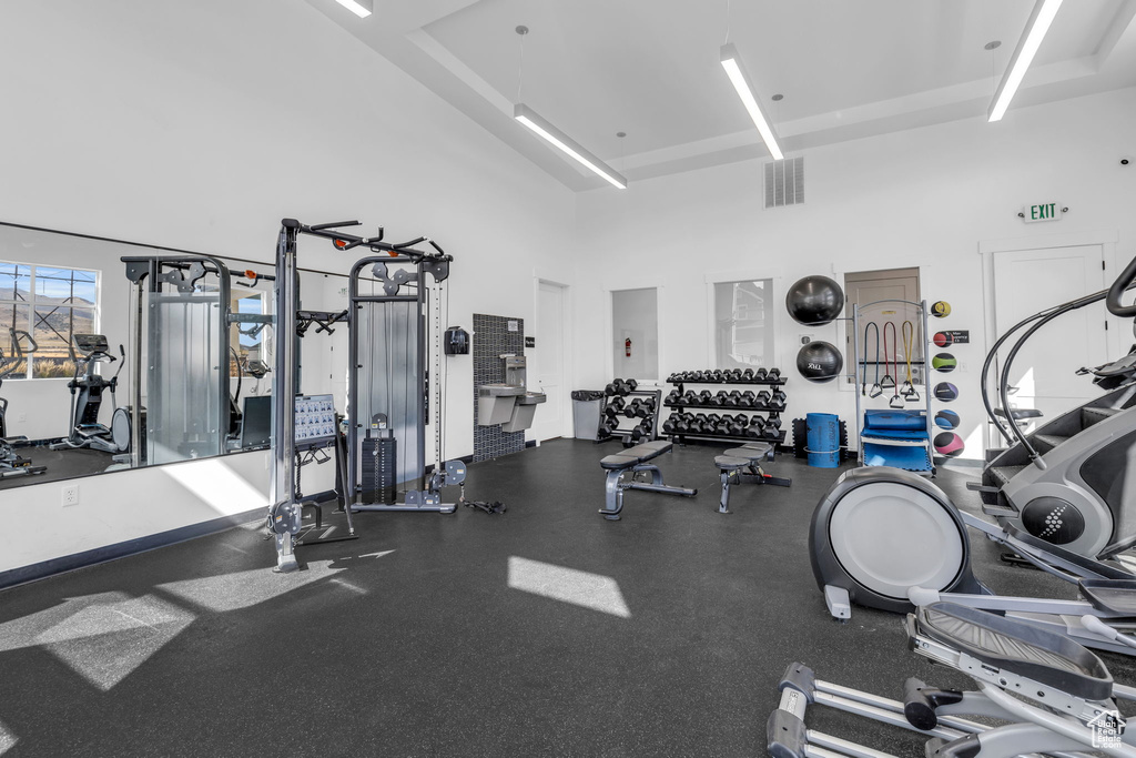 Workout area with a high ceiling