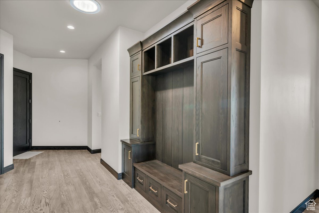 Mudroom featuring light wood-type flooring