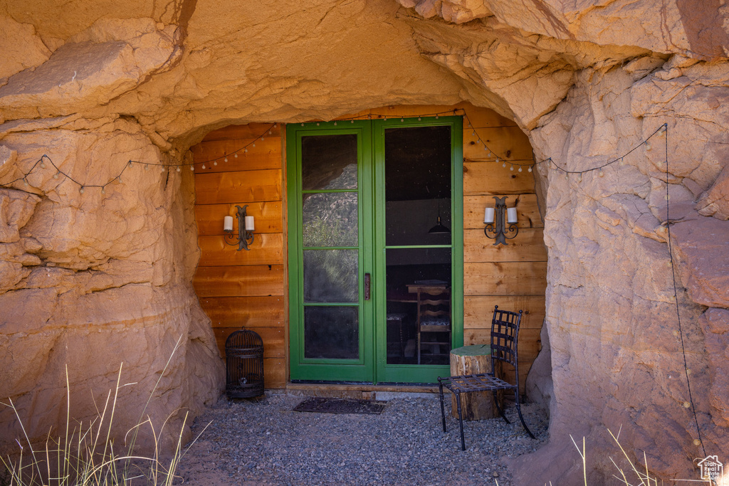 View of exterior entry featuring french doors