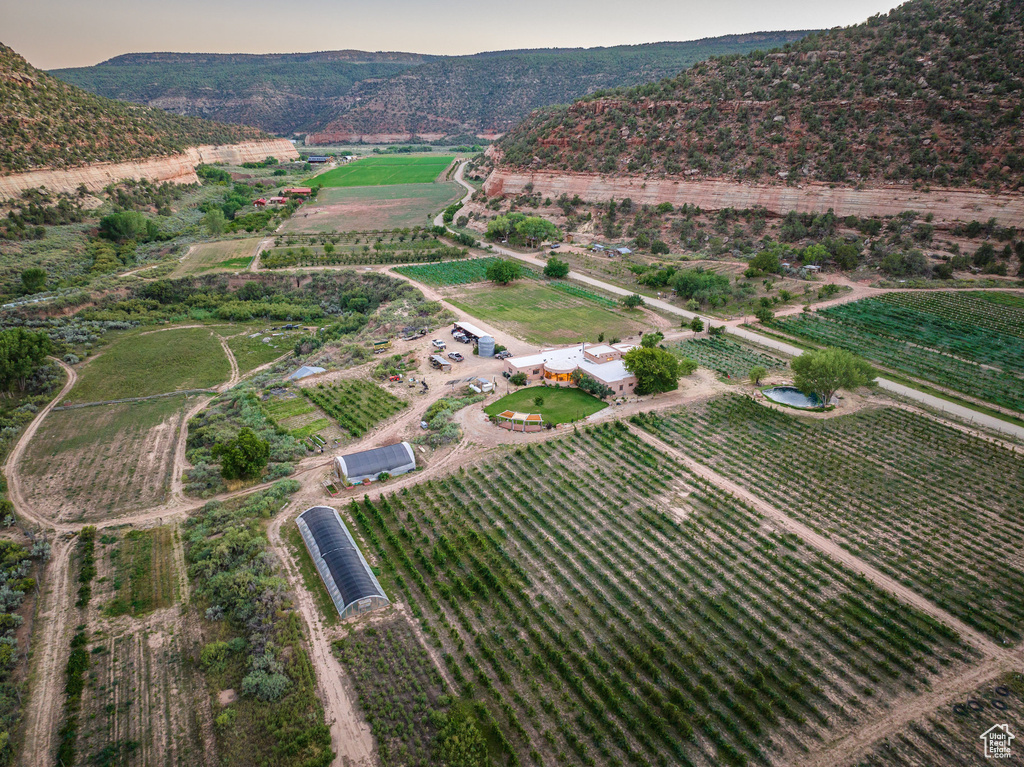 Birds eye view of property with a rural view