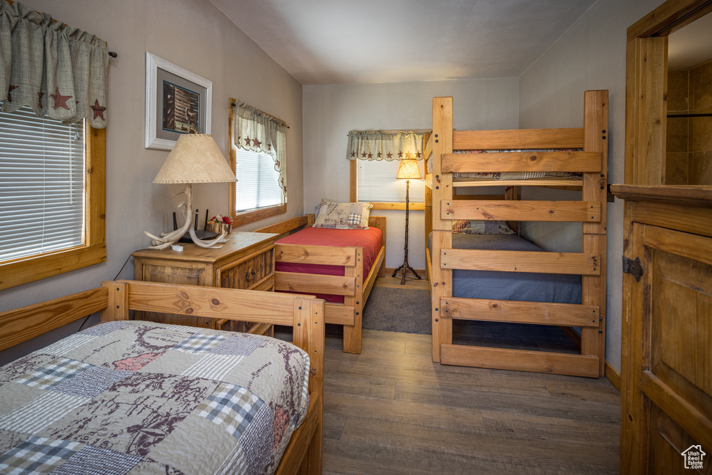 Bedroom with wood finished floors