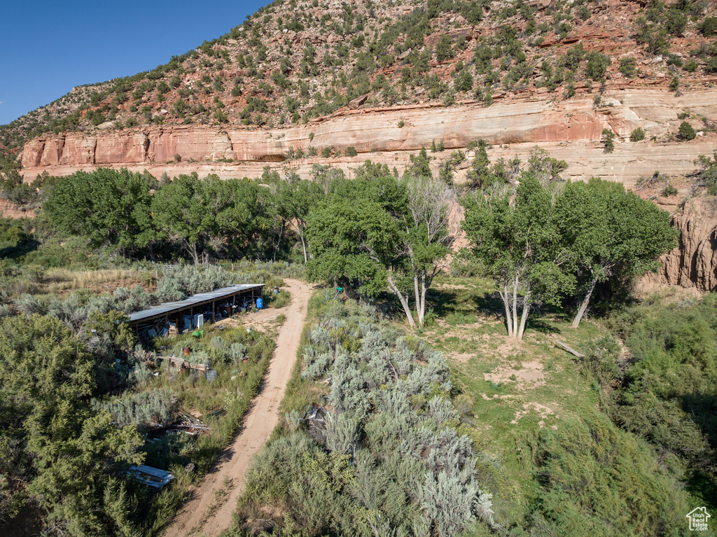 Birds eye view of property with a rural view and a mountain view