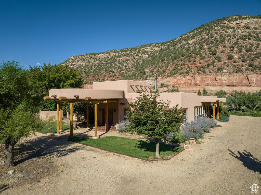 View of front of property featuring a mountain view