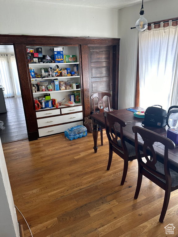 Dining space featuring hardwood / wood-style flooring and a wealth of natural light