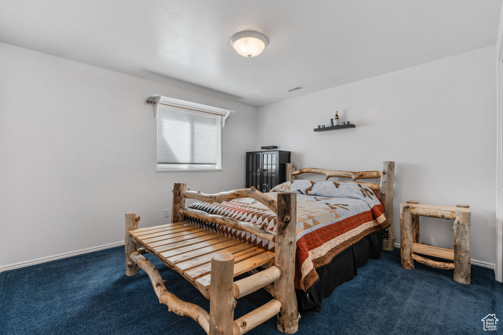 Bedroom with carpet flooring