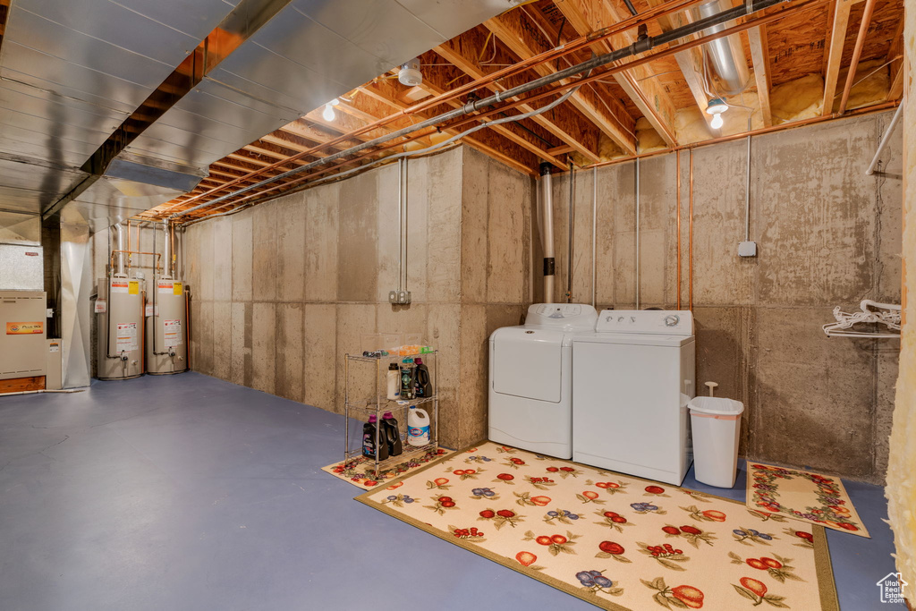 Basement with gas water heater and independent washer and dryer