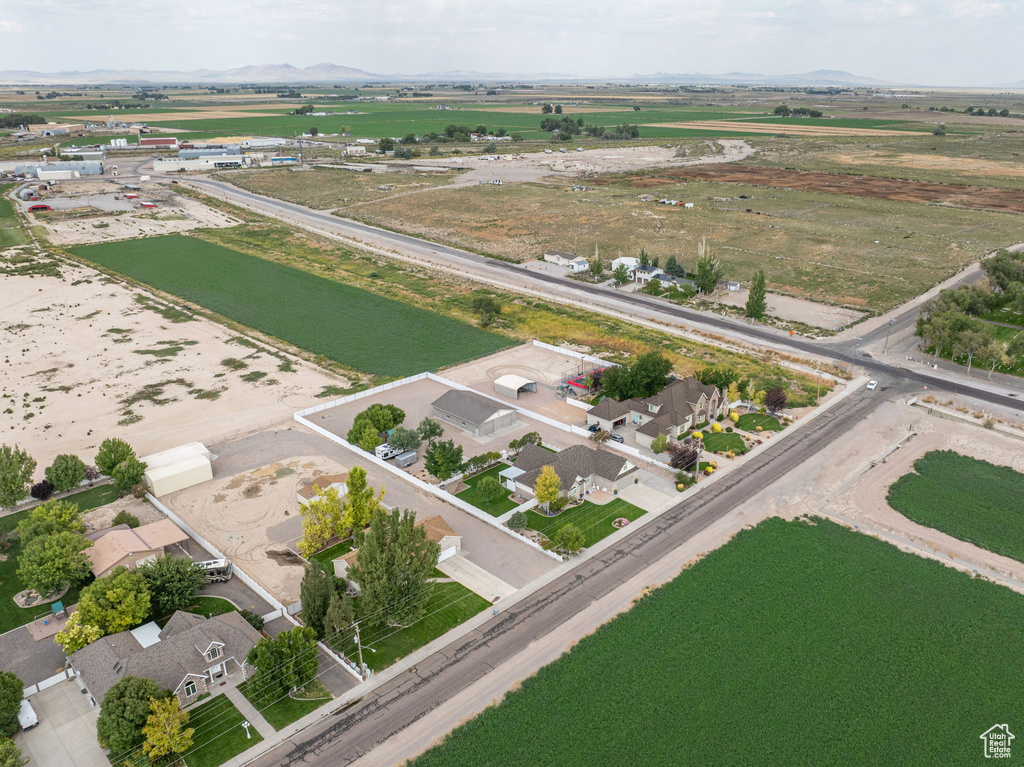 Birds eye view of property with a rural view