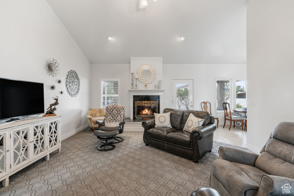 Living room featuring vaulted ceiling