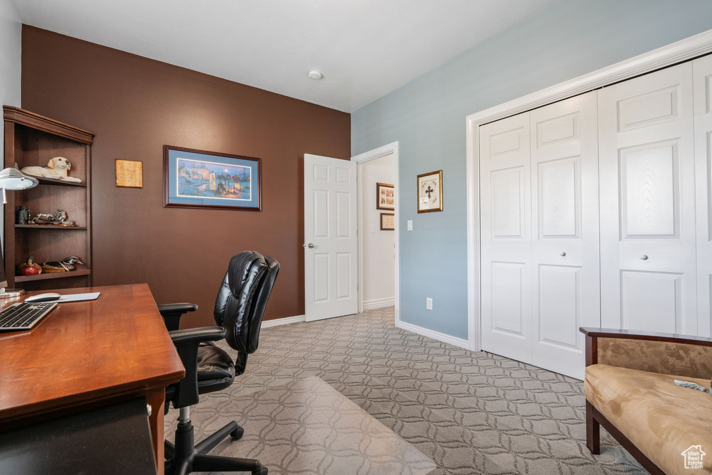 View of carpeted home office