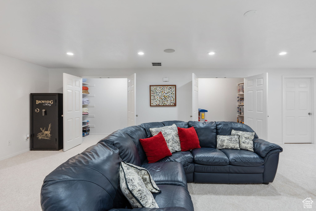 Living room featuring light colored carpet