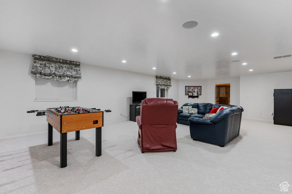 Game room with light carpet