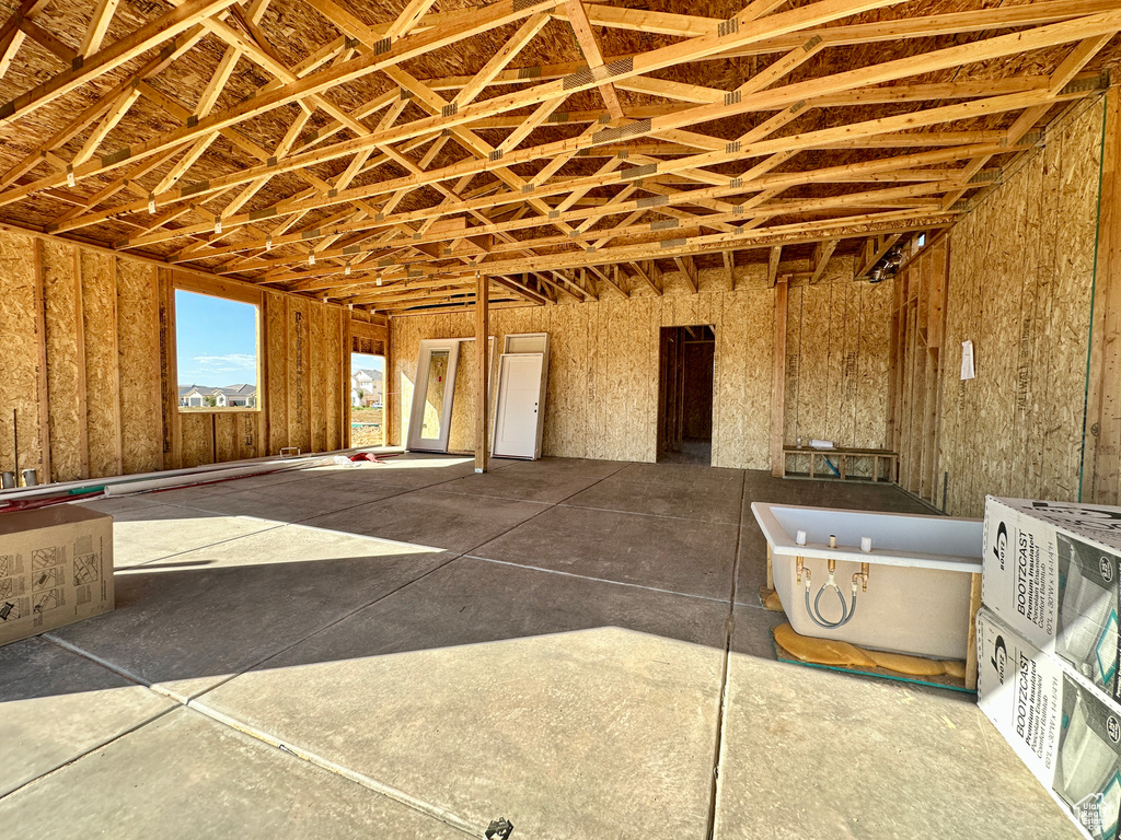 Miscellaneous room with lofted ceiling