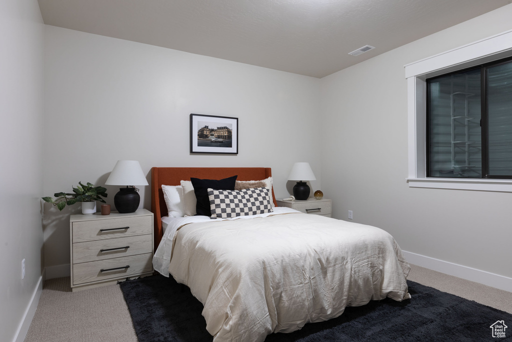 View of carpeted bedroom