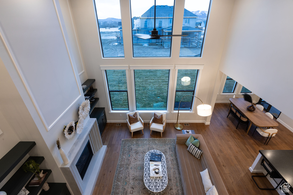 Living room with hardwood / wood-style floors