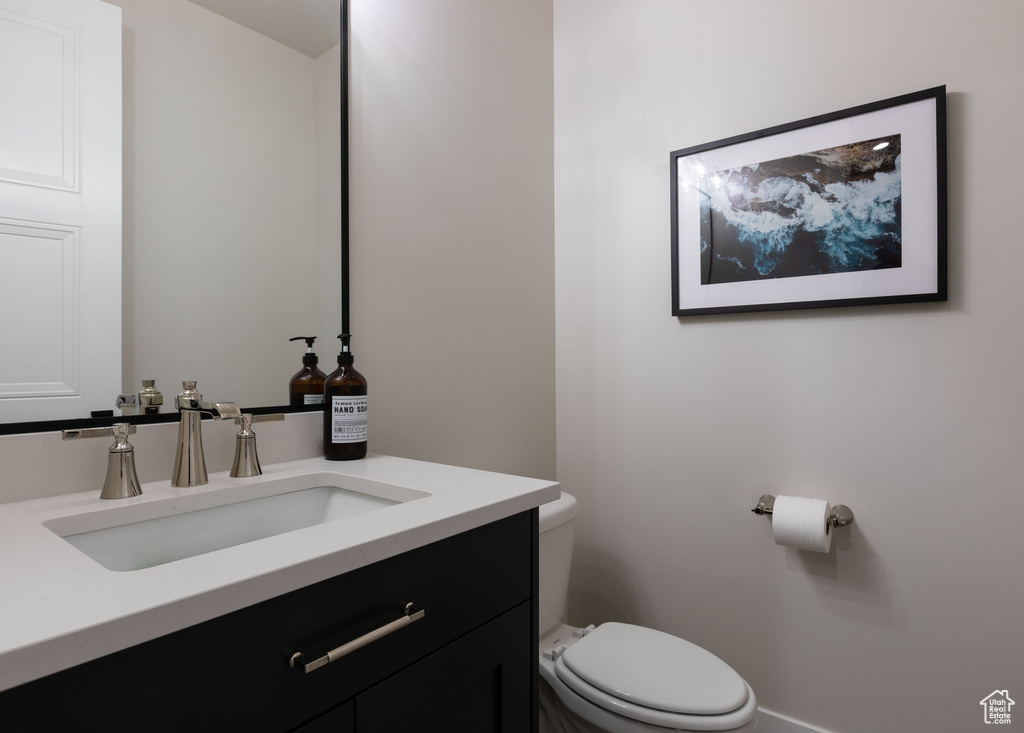 Bathroom with vanity and toilet