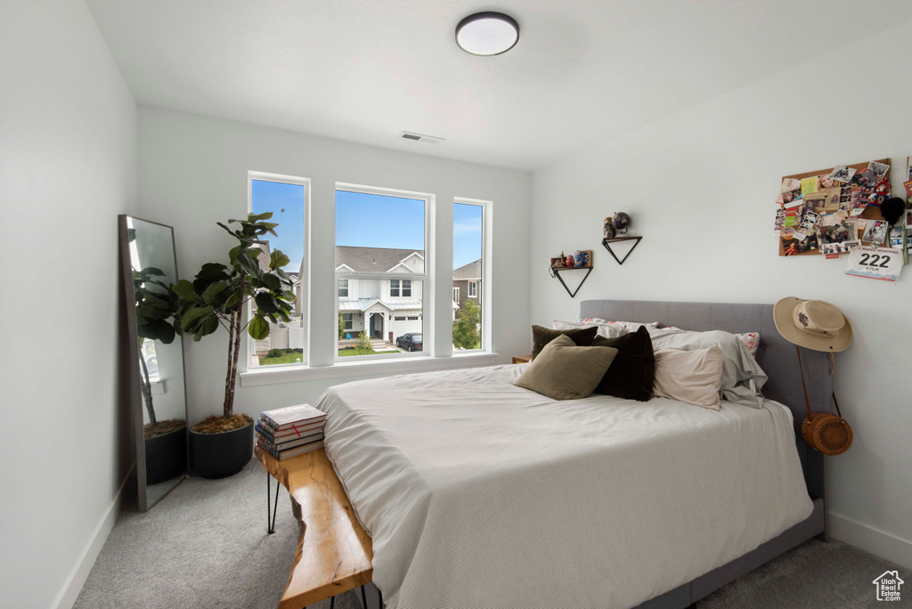 Bedroom featuring carpet