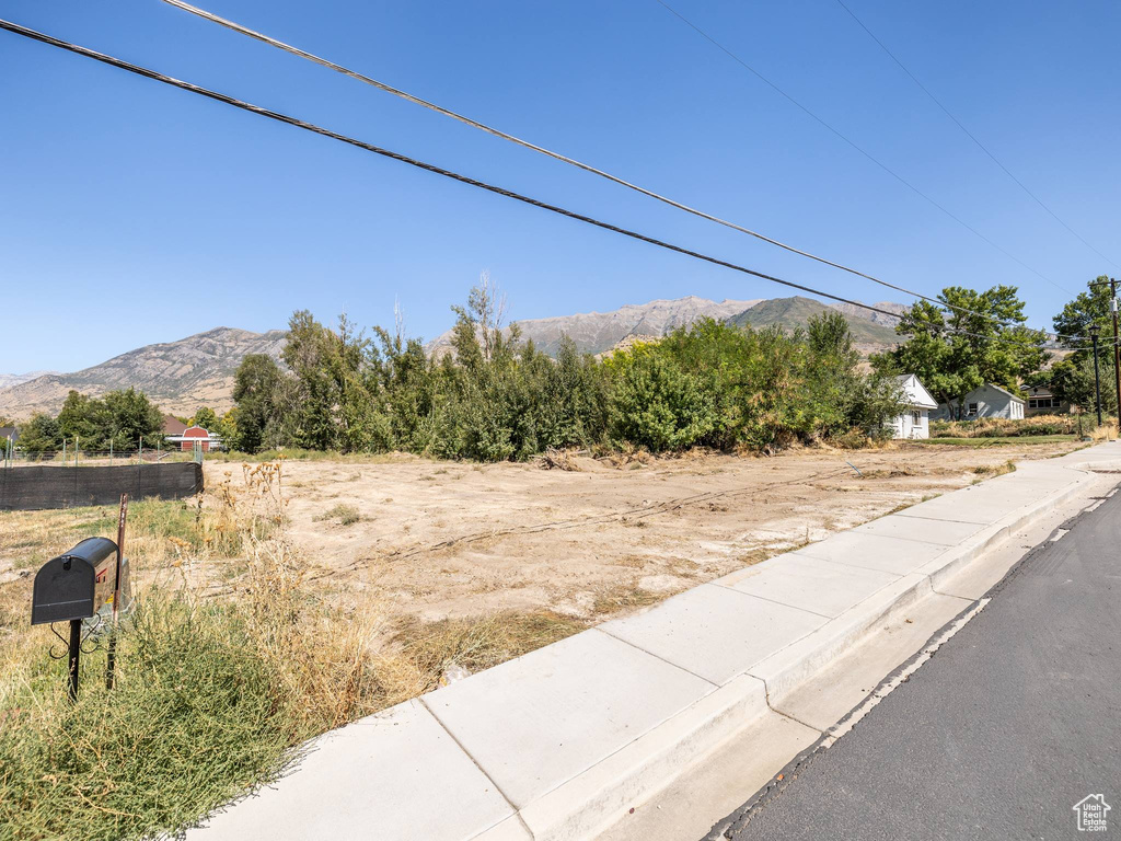 View of yard with a mountain view