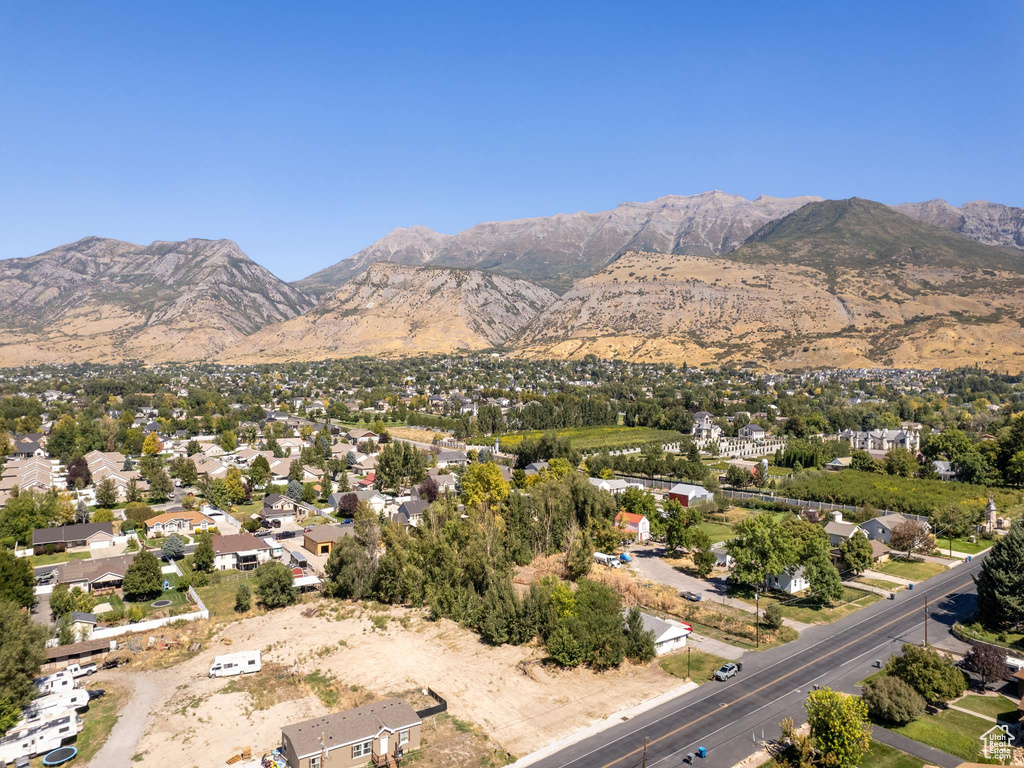 Birds eye view of property featuring a mountain view