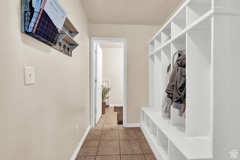 Mudroom featuring light tile patterned floors