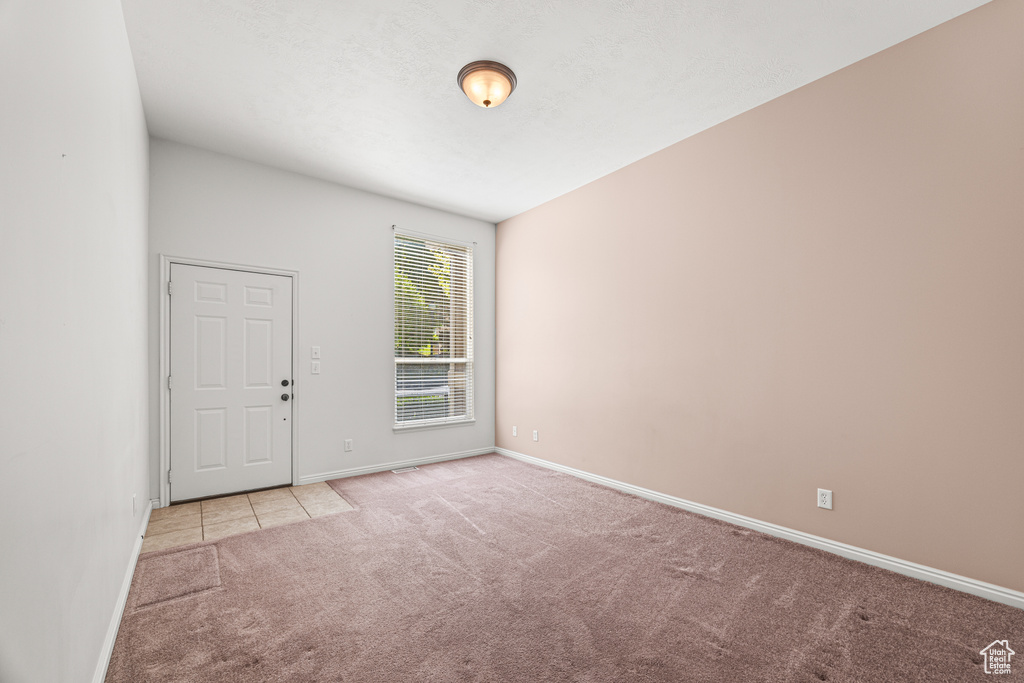 View of carpeted spare room