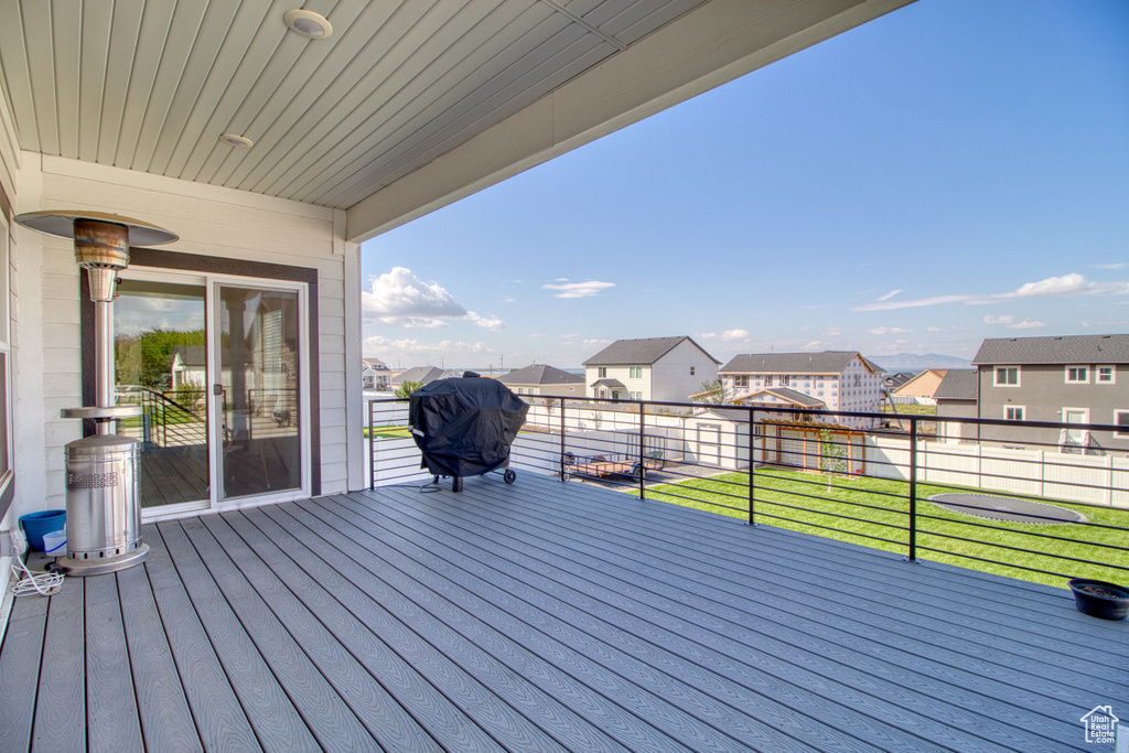 Deck with a lawn and grilling area