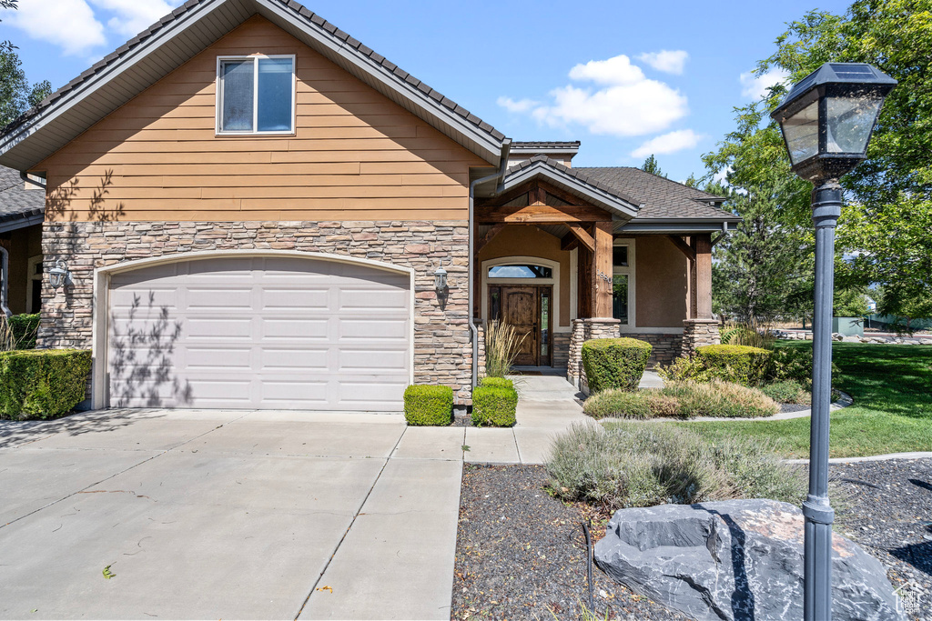 View of front facade with a garage