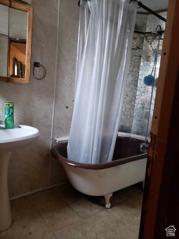 Bathroom featuring tile patterned flooring