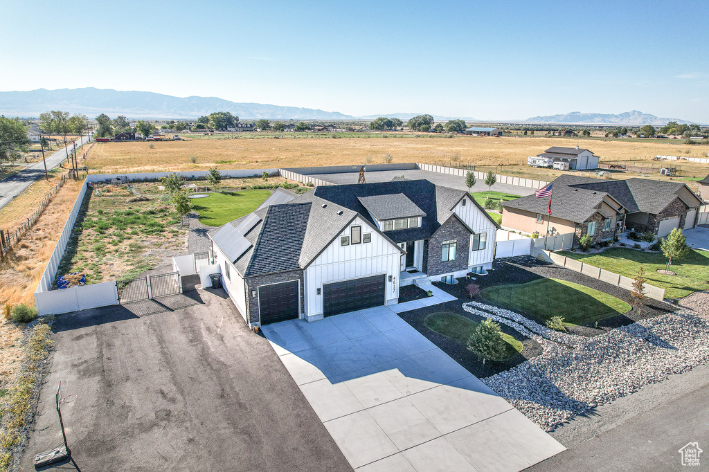 Drone / aerial view with a rural view and a mountain view