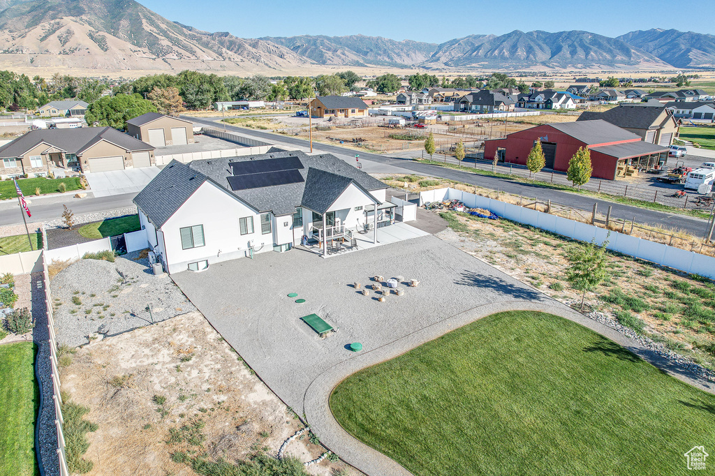 Birds eye view of property featuring a mountain view