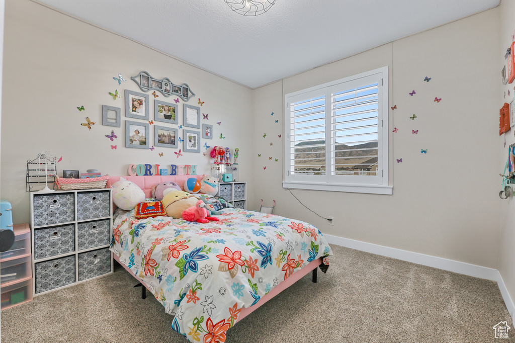 Bedroom with carpet flooring