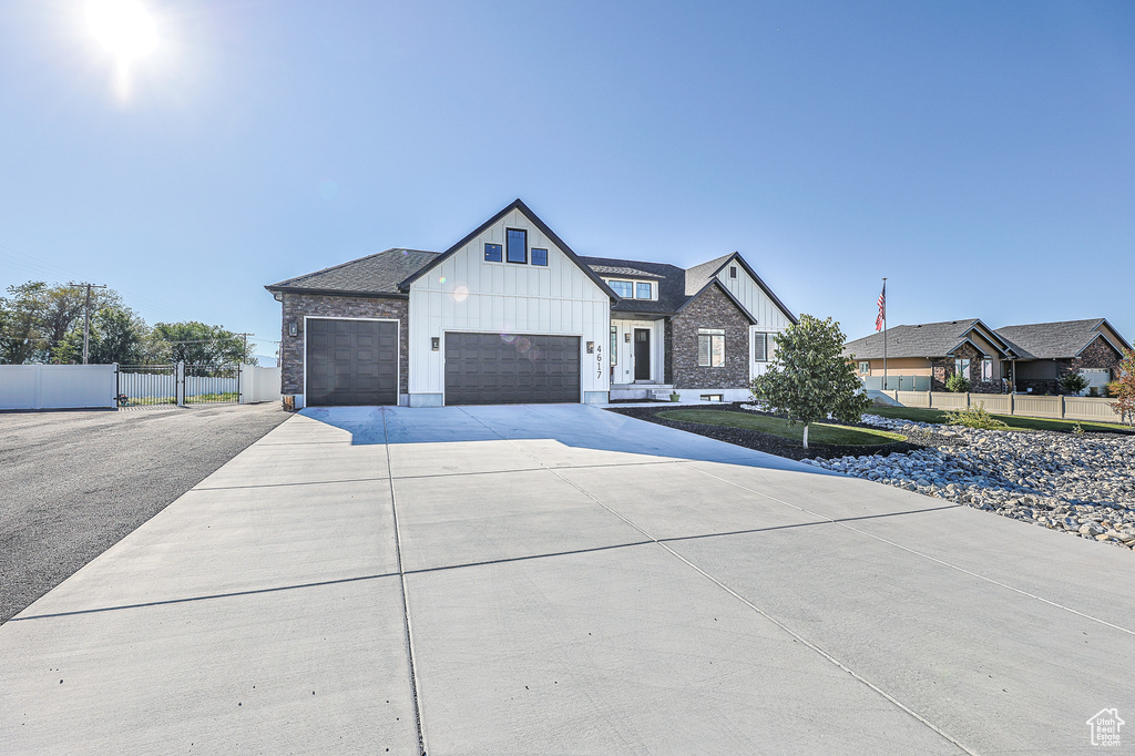 Modern farmhouse featuring a garage