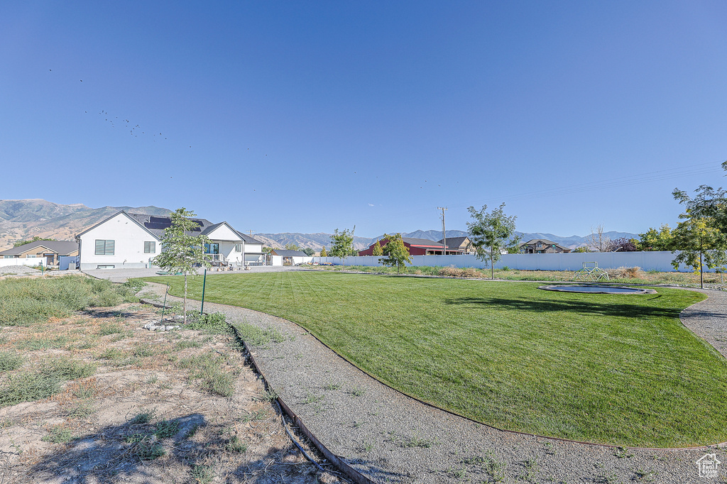 View of yard with a mountain view