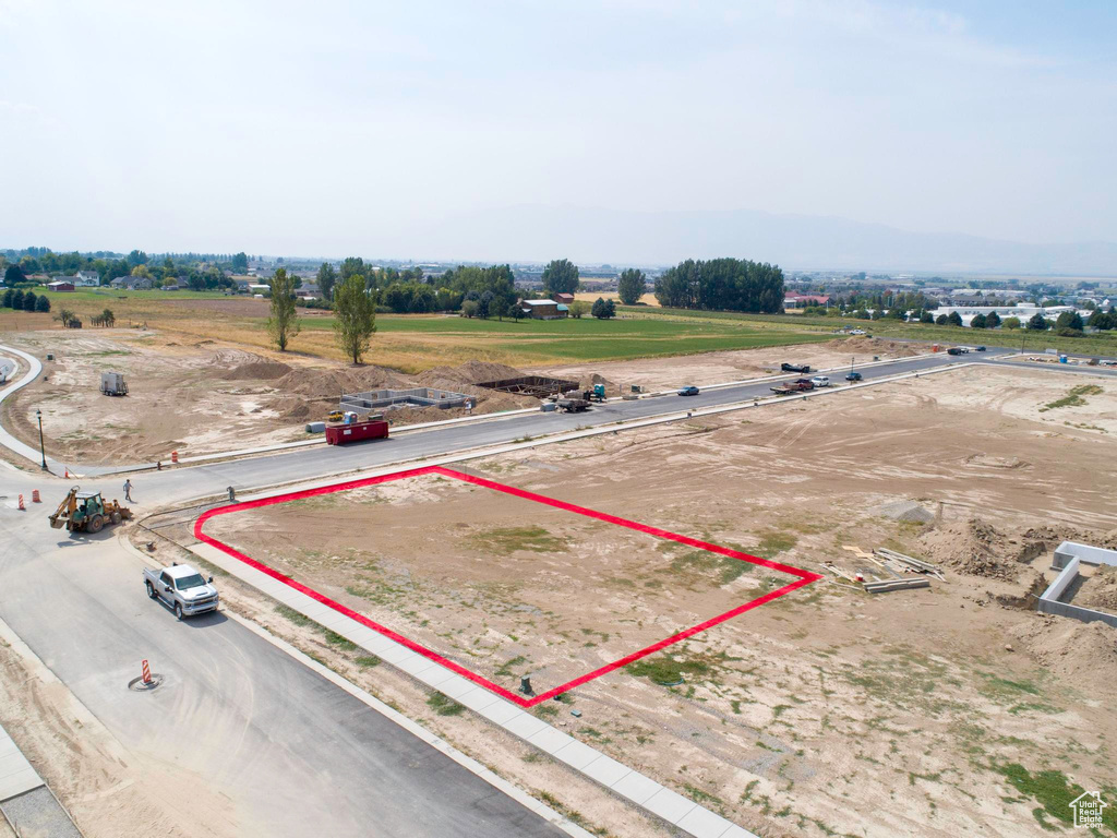 Birds eye view of property featuring a rural view