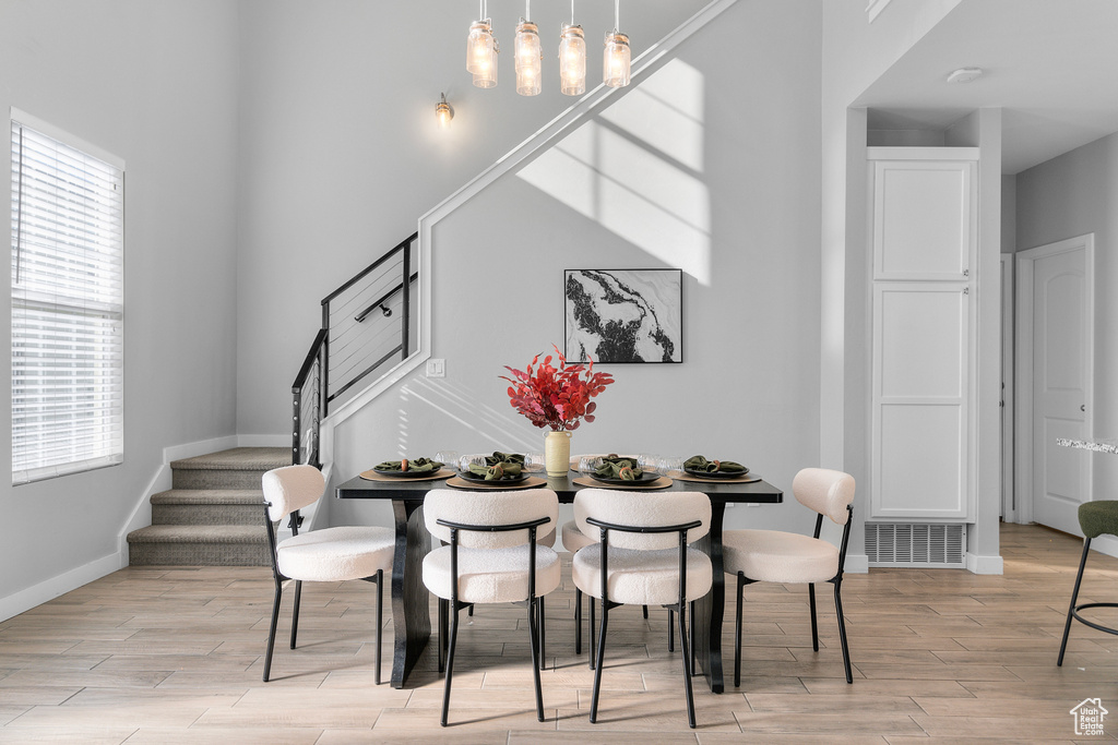 Dining space featuring light wood-type flooring