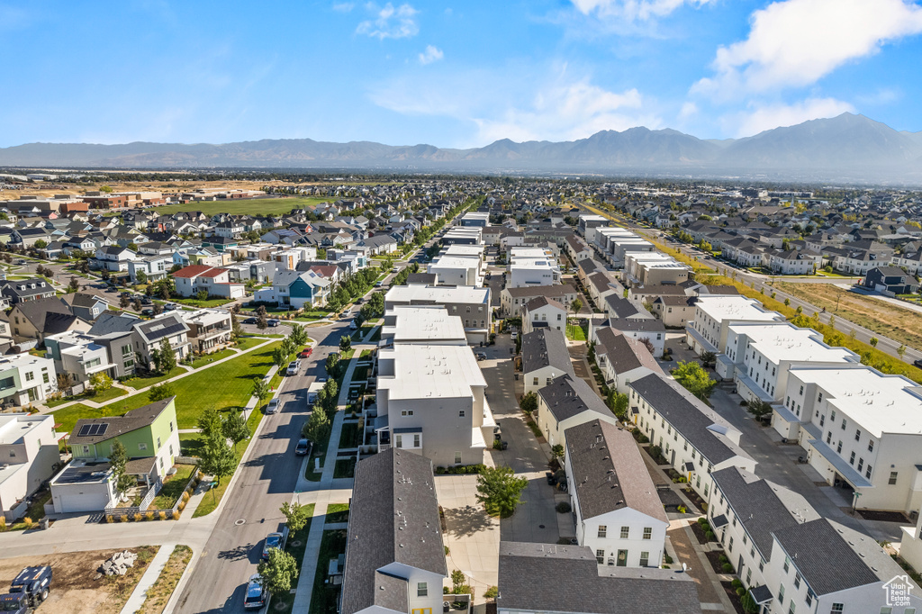 Birds eye view of property with a mountain view