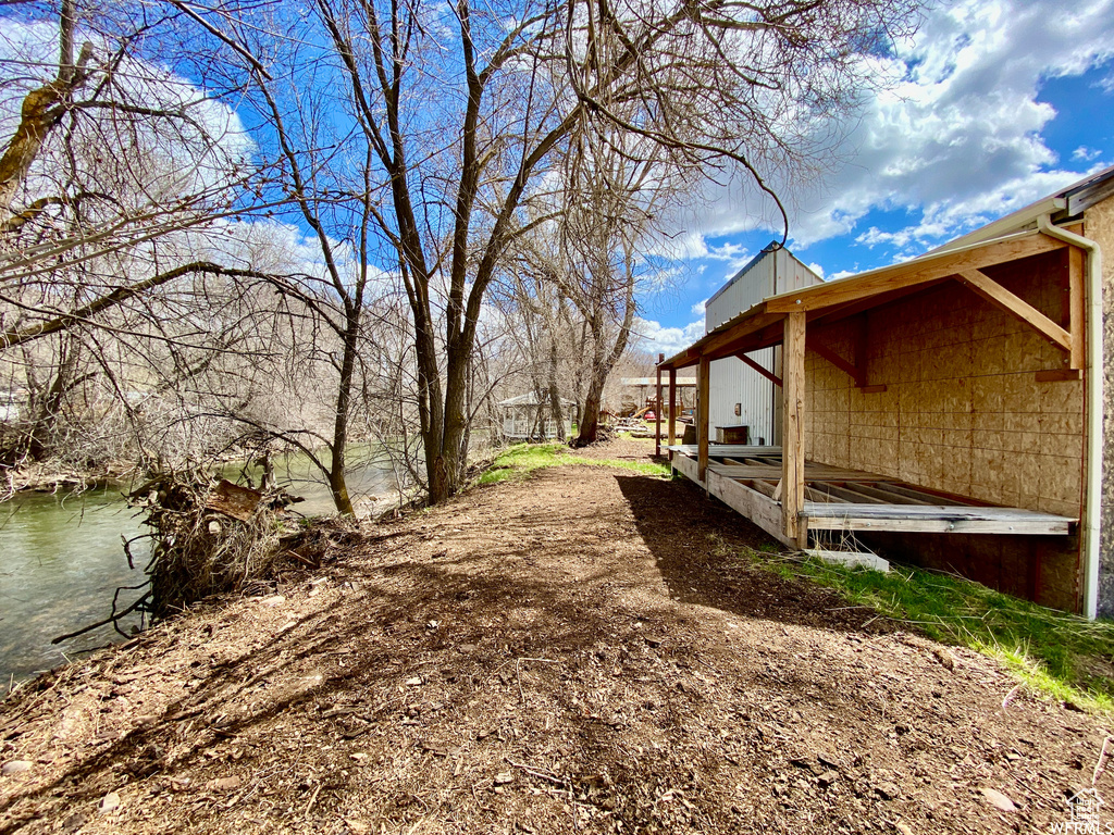 View of yard featuring a water view