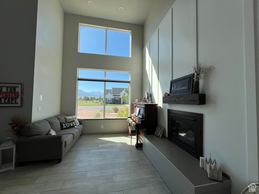 Living room with light hardwood / wood-style flooring