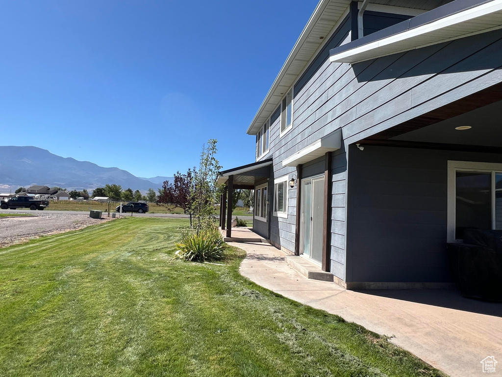 View of yard with a mountain view