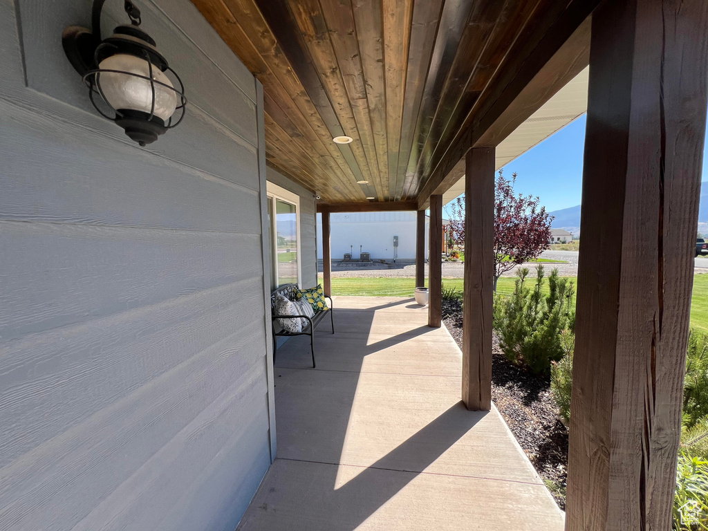 View of patio featuring covered porch