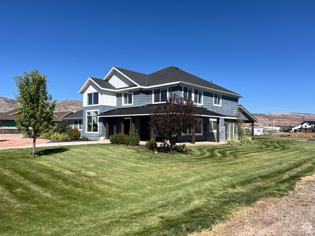 View of front of home with a front lawn