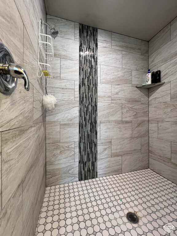 Bathroom with tiled shower