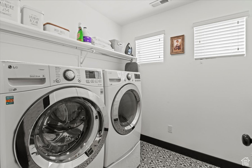 Laundry room featuring washer and dryer