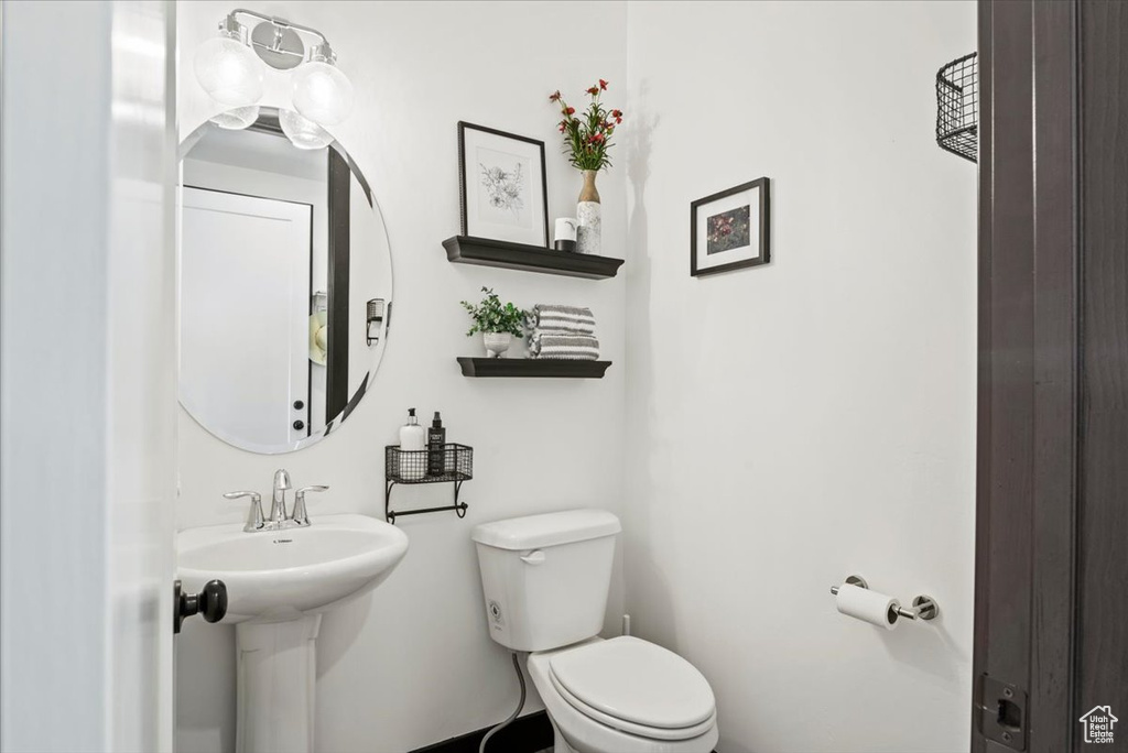 Bathroom with toilet and sink