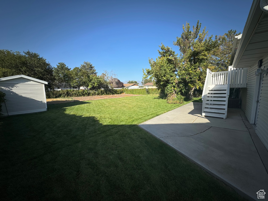 View of yard featuring a patio