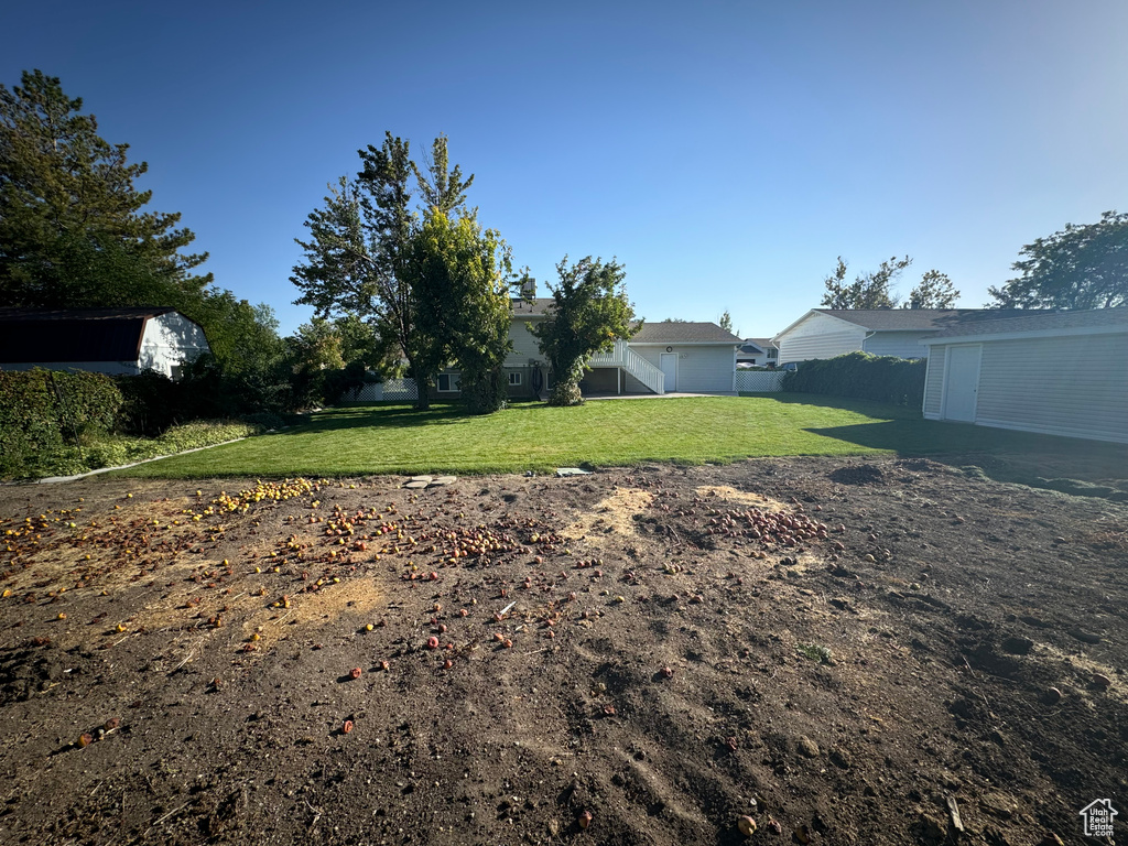 View of yard with an outbuilding