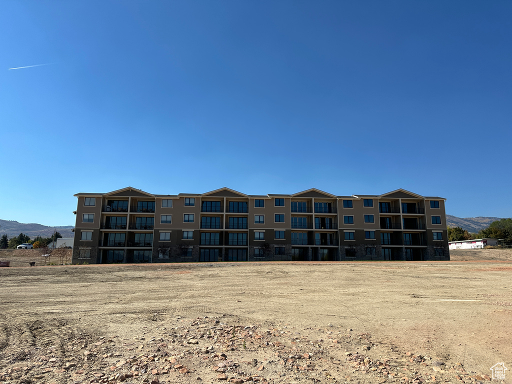 View of building exterior featuring a mountain view