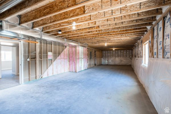 Basement featuring a healthy amount of sunlight