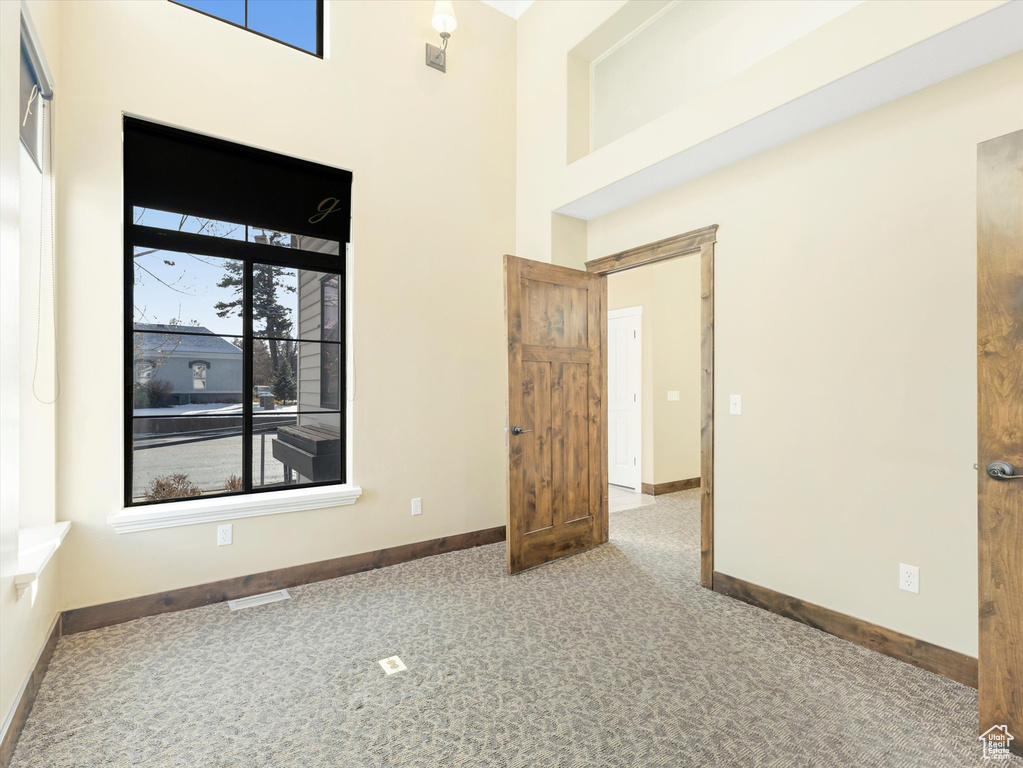 Empty room featuring carpet