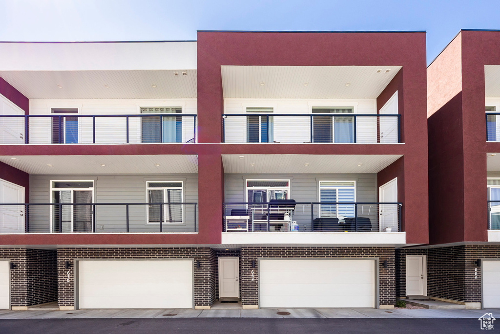 View of property featuring a garage